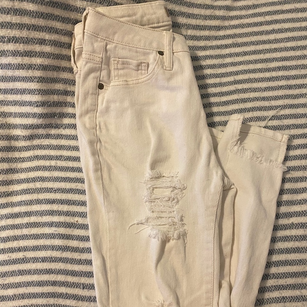 White ripped high rise jeans